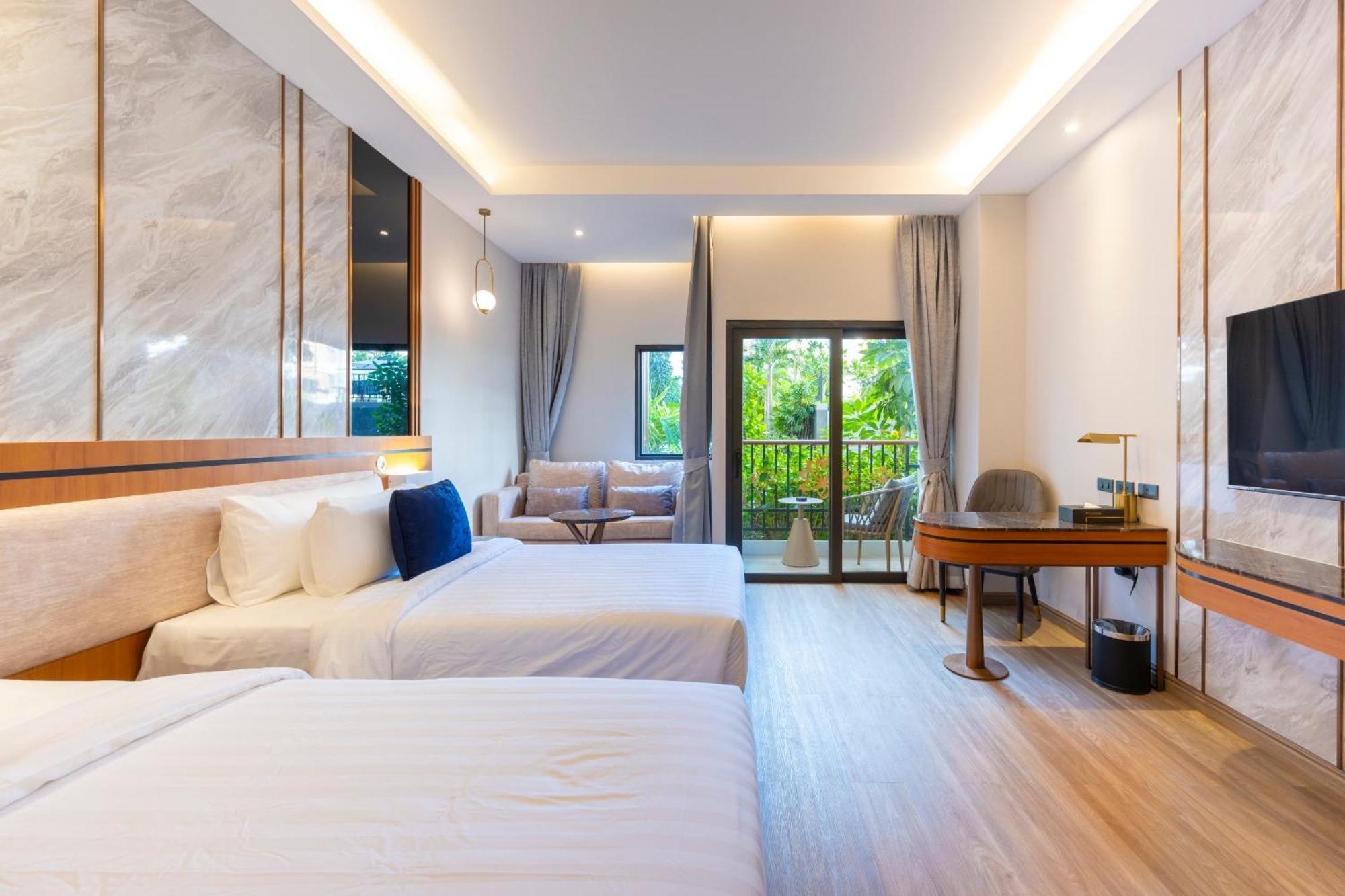 Hotel Wyndham Jomtien Pattaya à Na Chom Thian Extérieur photo